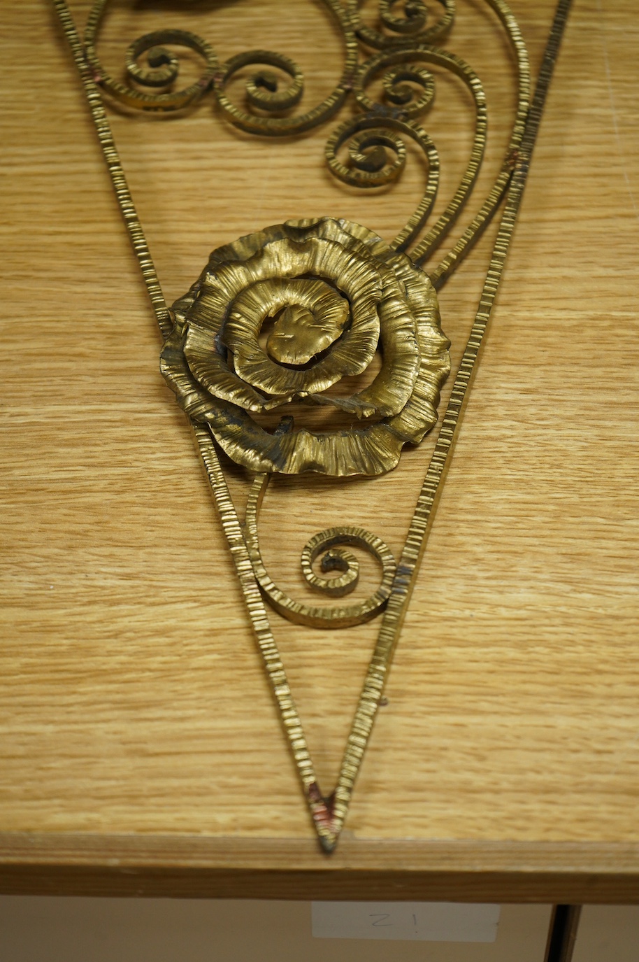 A decorative French gilt metal mirror, 67cm high. Condition - fair/good